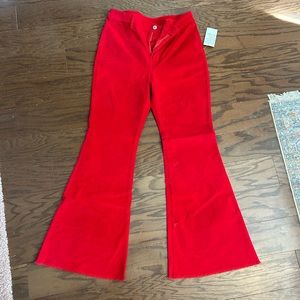 Red corduroy flares